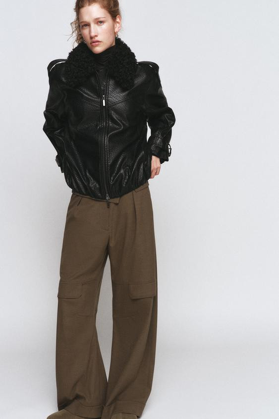 ZARA WOMAN COLLECTIONBomber jacket made from faux leather fabric. Lapel collar with detachable fa... | Zara US