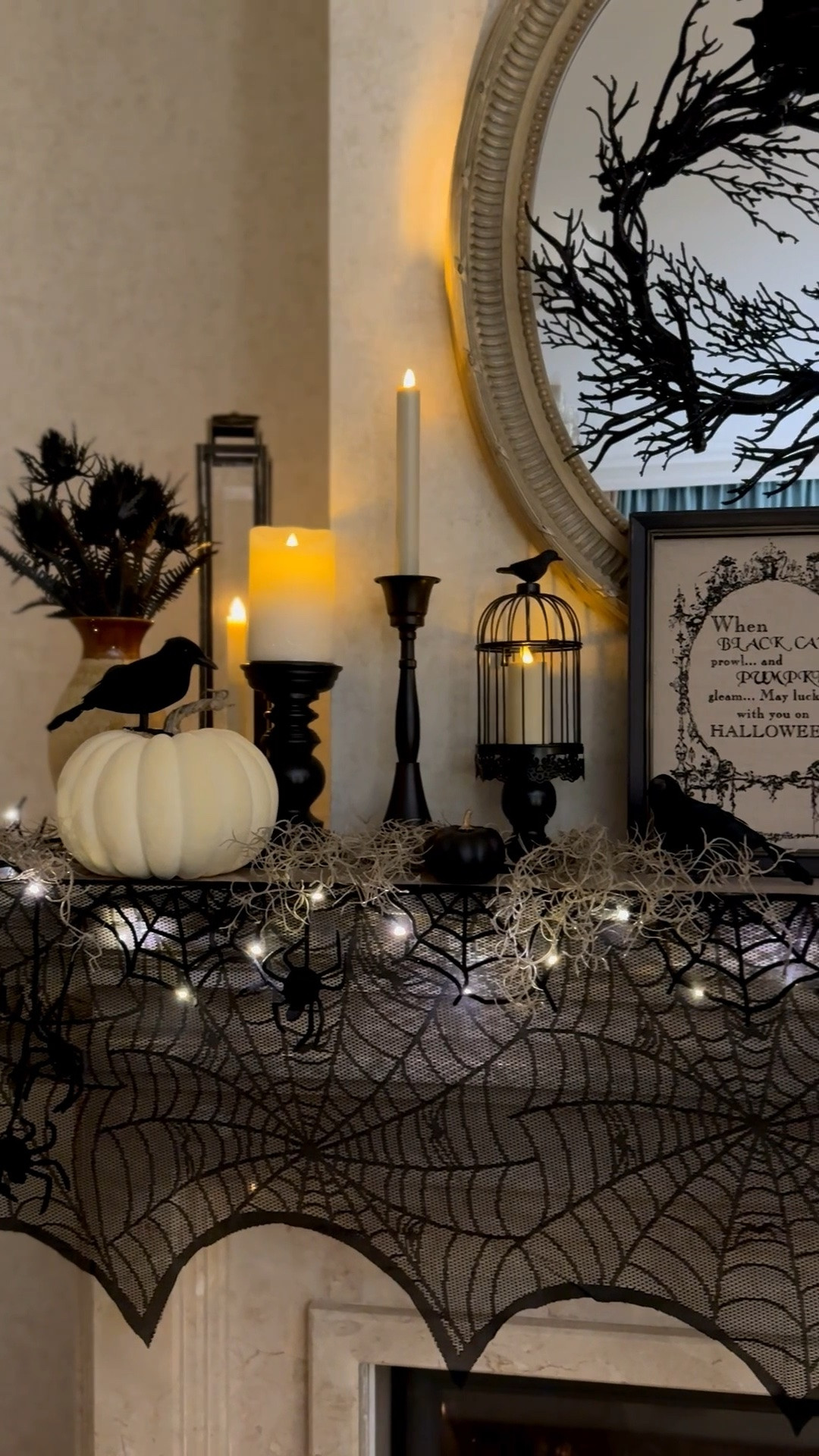 Halloween living room mantel decor, black candlesticks, skull candle, Halloween home decor from Amazon