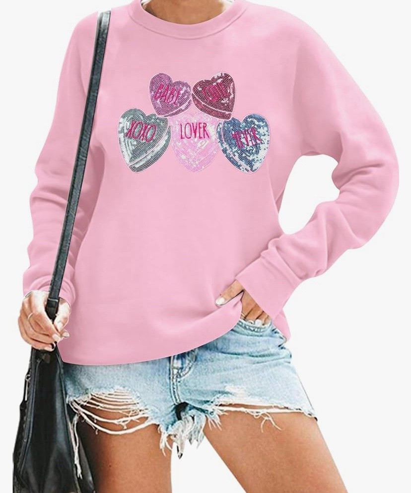 Under $20 - I love this sparkle sweatshirt and it comes in more colors with a quick ship ! 


#teacheroutfit #heartsweatshirt #hearttop #valentinesday #under20 #budgetfriendly #salefinds 

#LTKOver40 #LTKSaleAlert #LTKSeasonal #LTKU #LTKFindsUnder50