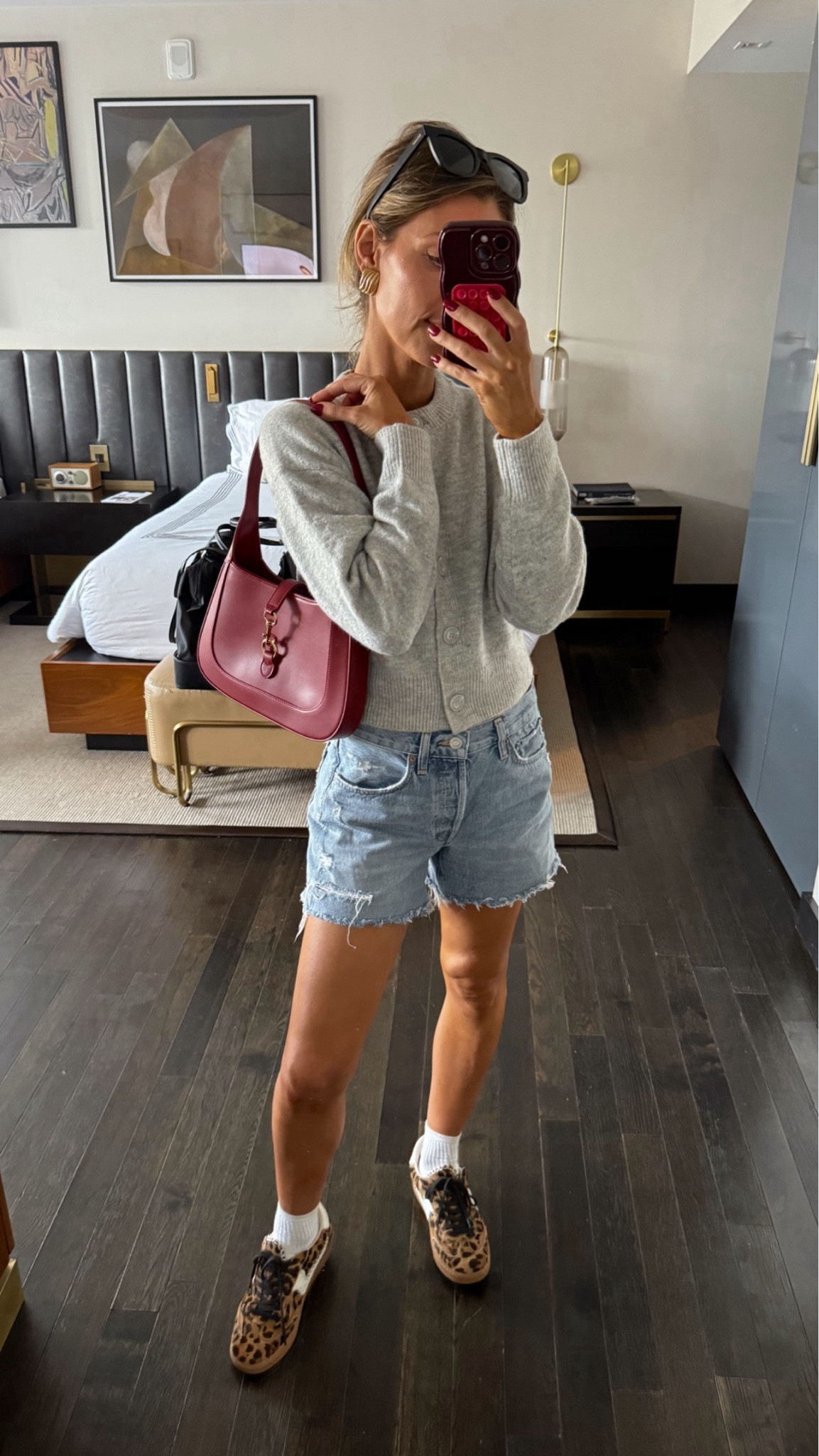 Outfit I wore to check in at LTKCon! Dynamite clothing cardigan xs 
Old agolde denim shorts 25
Dolce vita leopard sneakers 
Amazon red purse 


#LTKCon #LTKStyleTip #LTKFindsUnder50