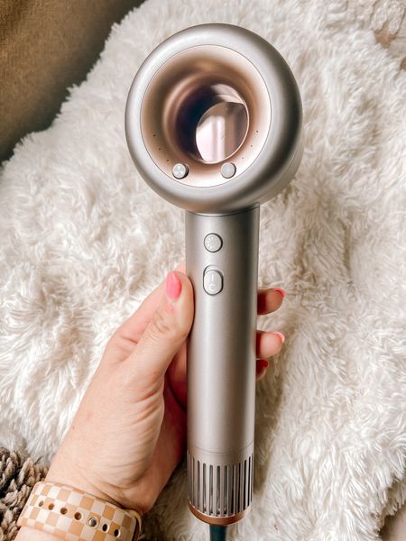 This hair dryer performs like a Dyson for a fraction of the price, and now on clearance! It has four temperatures, 3 speeds, and is very gentle on hair. 

#LTKFindsUnder100 #LTKBeauty #LTKSaleAlert