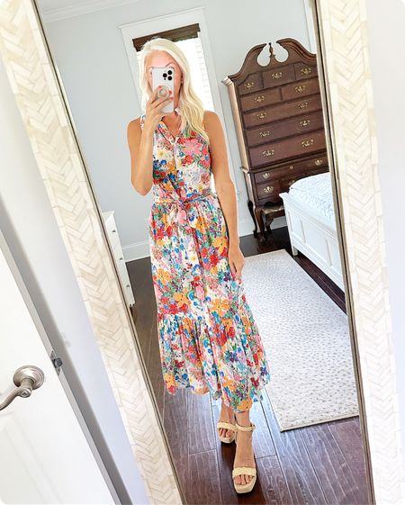 Beautiful floral dress for summer.  Ties at the waist or you can wear it without the belt. Runs big.  Wearing an XS.