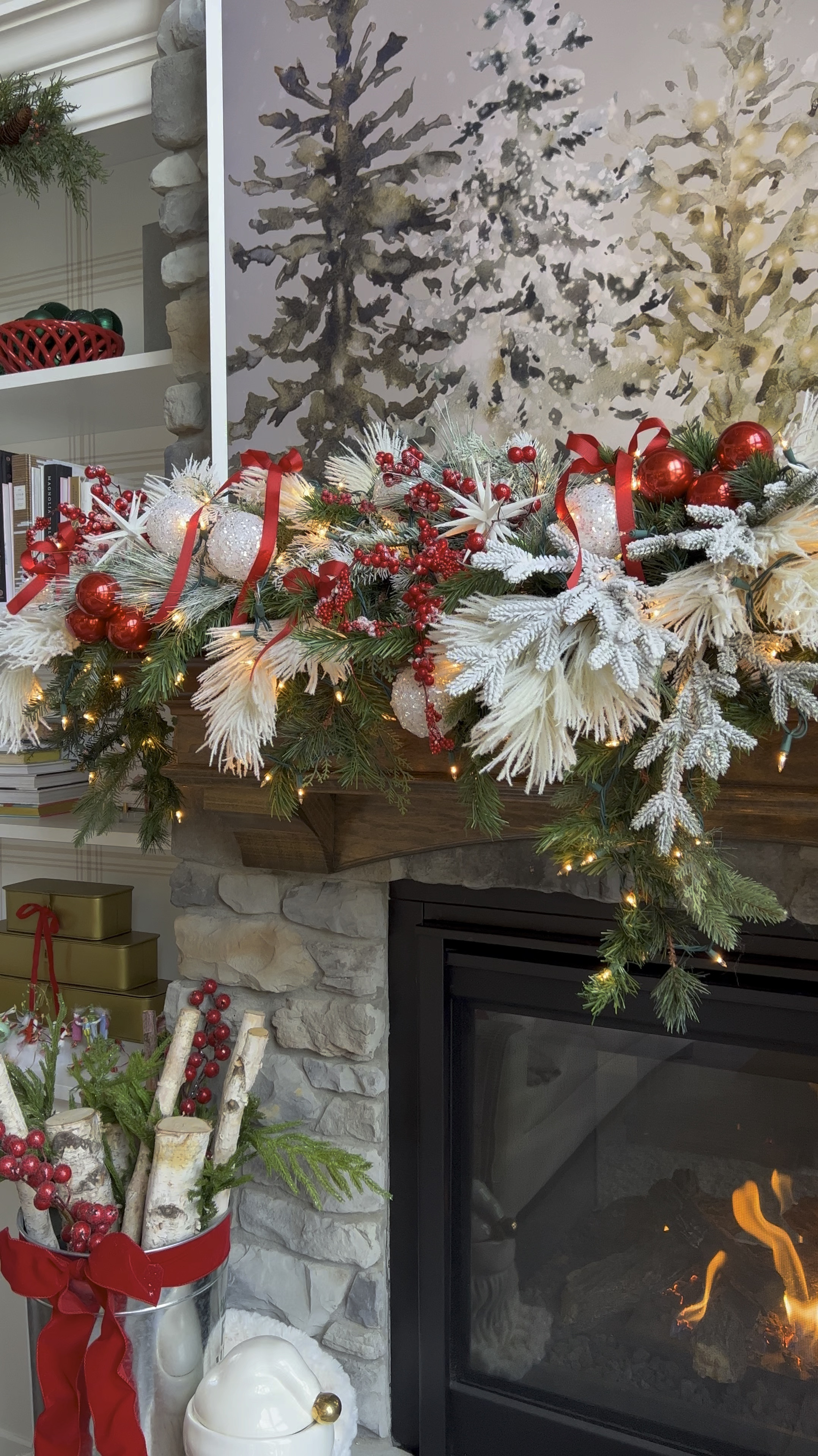 Everything you need to recreate my holiday mantel garland! This garland went down as one of my most favorite ever. Here are the estimated quantities of each item that I recommend :

Cascading Garland: 1 
Flocked Stems: 4 of each style
Red Berry Stems: 4 
White Ornaments: 12
Red Ornaments: 12 (display as clusters of 3)
White Star Ornaments: 4
Red Ribbon: 1 spool (tied into 6 small bows throughout the garland) 
Lights: 1 strand of the “clear twinkle” color for a little sparkle

I’m also linking our exact stockings, name tags and a similar set of gold bells that I hang with the name tags  

#LTKVideo #LTKHome #LTKSeasonal