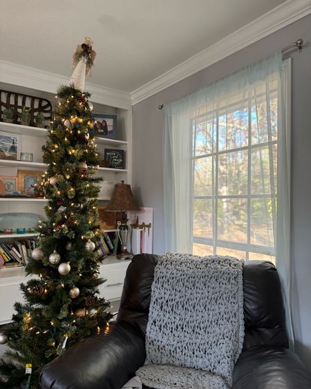 Our pencil tree is perfect for our small living space! 

#LTKHoliday #LTKfindsunder100 #LTKfamily