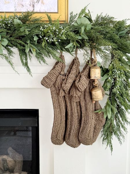 Christmas stockings on the fireplace mantel.

Christmas target hearth hand knit bells gold living room 

#LTKSeasonal #LTKHoliday #LTKhome