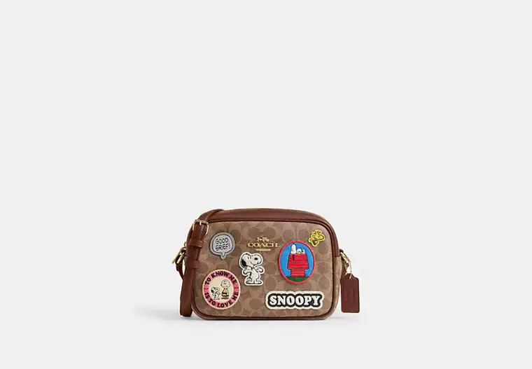 Coach X Peanuts Jamie Camera Bag In Signature Canvas With Patches | Coach Outlet US