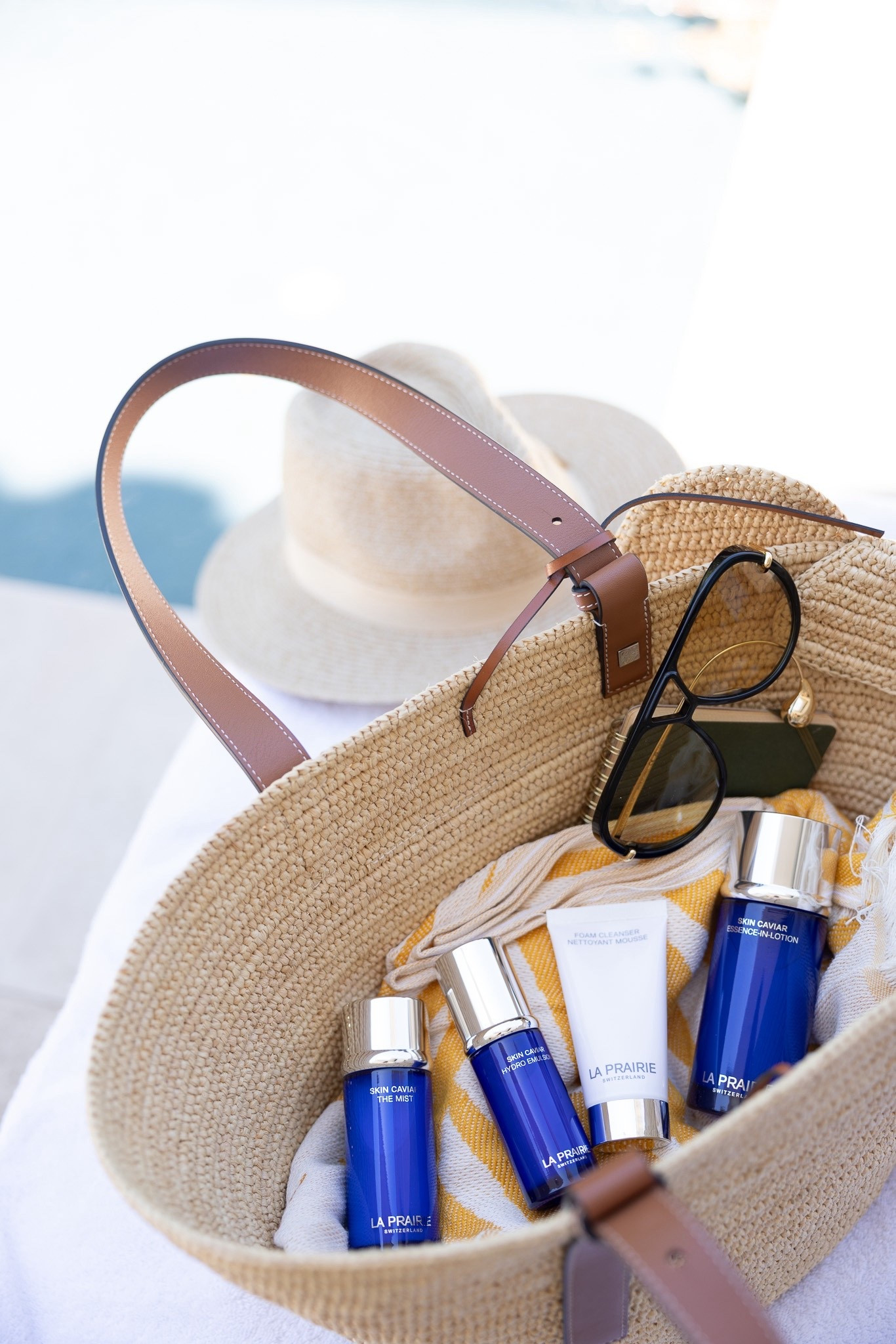 What’s in my summer bag? La Prairie’s Summer Essentials! The Foam Cleanser, Skin Caviar Essence-In-Lotion, Skin Caviar The Mist and the brand new Skin Caviar Hydro Emulsion. Find everything you need for your summer skin - cleanse, hydrate, glow and refresh with these Summer Essentials from La Prairie. Shop this must-have set during the Nordstrom Anniversary sale! @laprairie #laprairiepartner #skincaviar @nordstrom #nordstrompartner