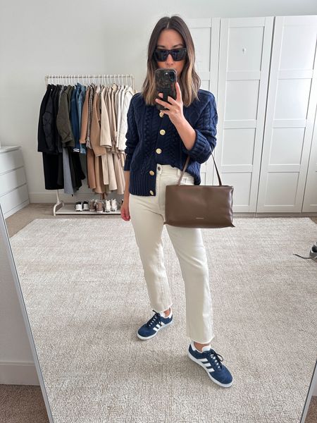New j.crew cable knit cardigan in navy blocked this sweater so much had to get it in another color. Wearing a small. 

J.crew cardigan small
DL1961 jeans 25
Adidas gazelles men’s 4
Mansur Gavriel bag 
Celine sunglasses  

#LTKSeasonal #LTKshoecrush #LTKitbag