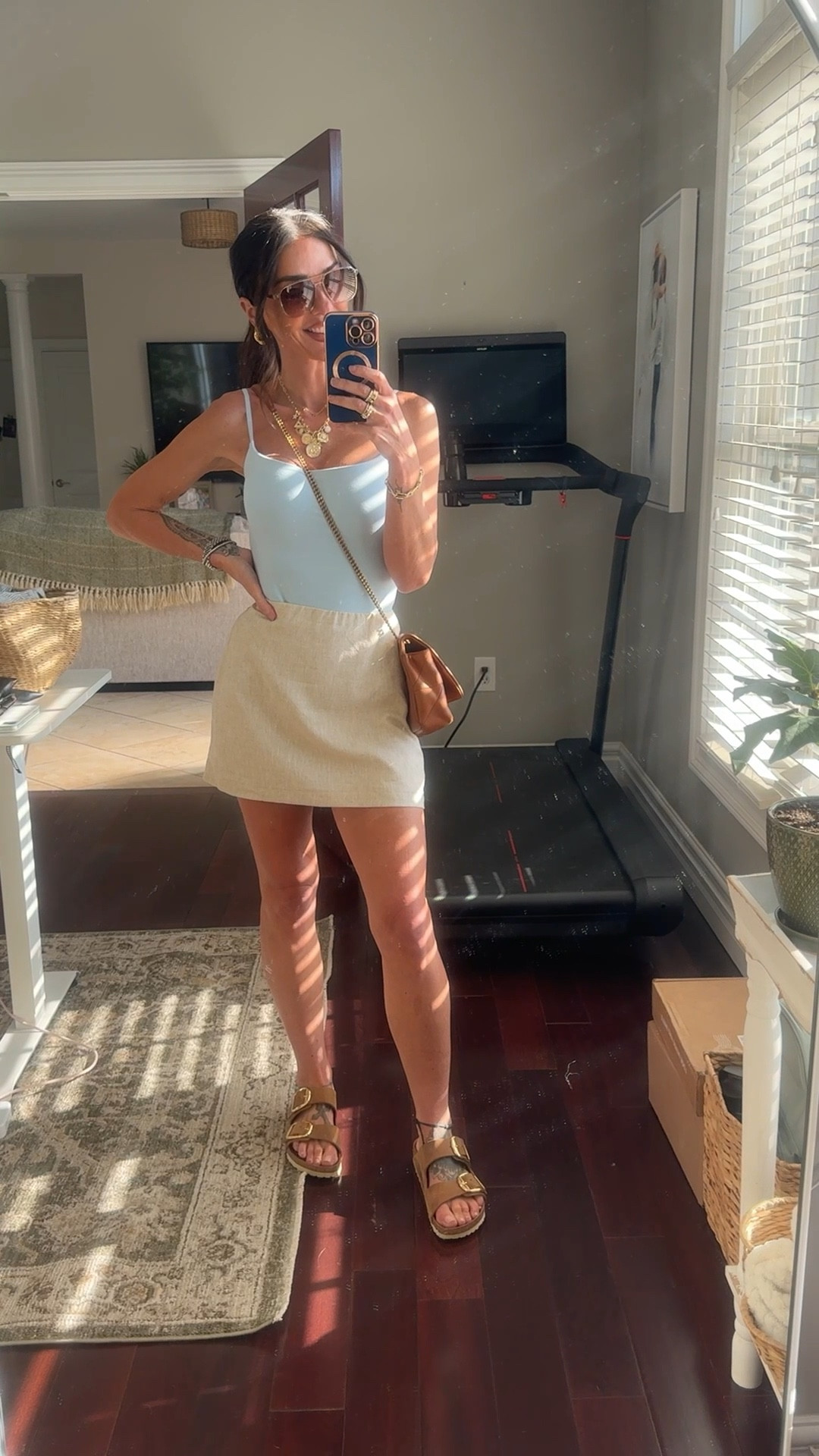 If summer had a uniform ☀️ This linen mini, baby blue tank, and oversized sunnies combo is my go-to for staying cool and cute.

#LTKSeasonal #LTKU #LTKFindsUnder100