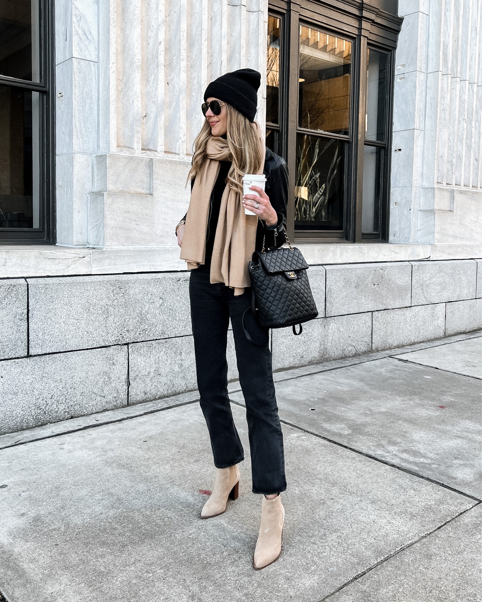 Fashion Jackson wearing black leather jacket, black jeans, tan booties, camel scarf, fall outfit, winter outfit, street style 

#LTKunder100 #LTKSeasonal #LTKstyletip