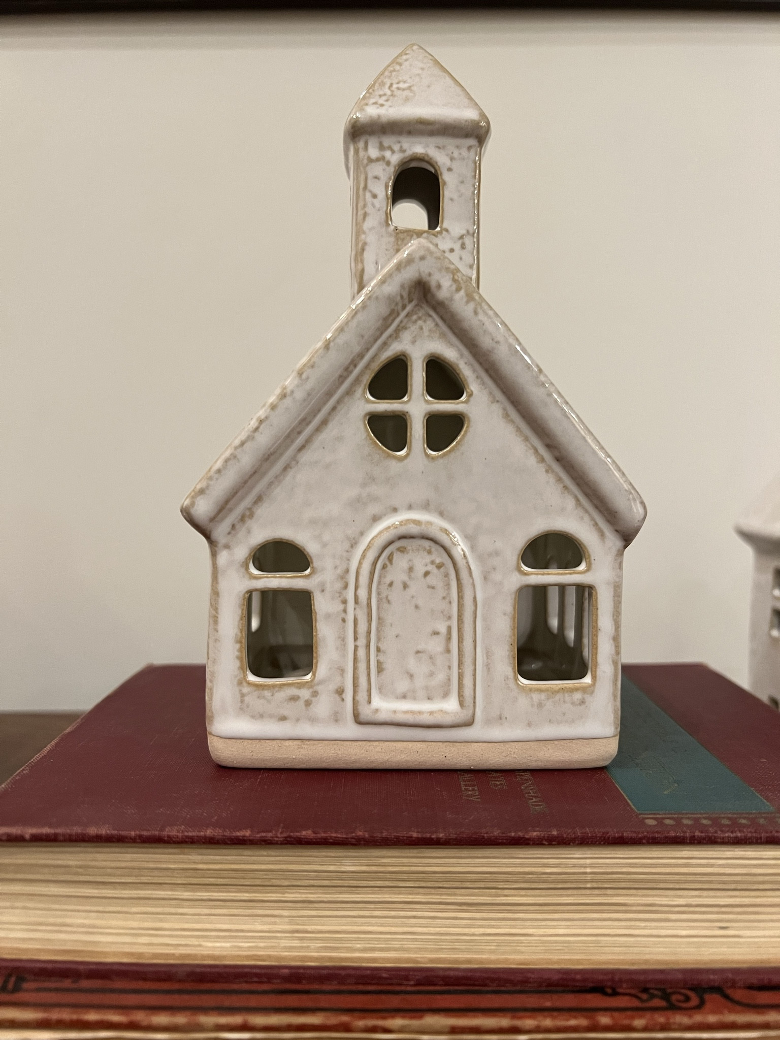 Add a glowing accent to your festive space with this Battery Operated LED Lit Ceramic Church Christmas Village Building from Wondershop™. This ceramic sculpture features a village church with windows and a door in a distressed white finish to add a rustic touch to your seasonal decorations. It comes with a flat base for easy display on any tabletop, and it's battery operated so you don't have to worry about finding an outlet to plug it into. Just place it on the mantel, console or sideboard along with other decorative pieces to complete your holiday display.


#LTKSeasonal #LTKhome #LTKHoliday