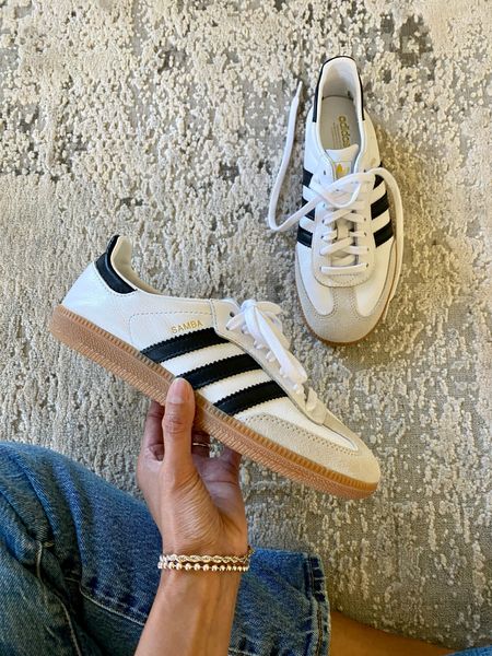 Adidas samba sneakers in stock. Multiple colors available. I sized down 1 whole size; could have gone down 1.5 sizes too. Make sure you are looking at the women’s size number when ordering. 
Straight leg jeans. 
Code HINTOFGLAM to save on bracelets  

#LTKover40 #LTKfindsunder100 #LTKshoecrush