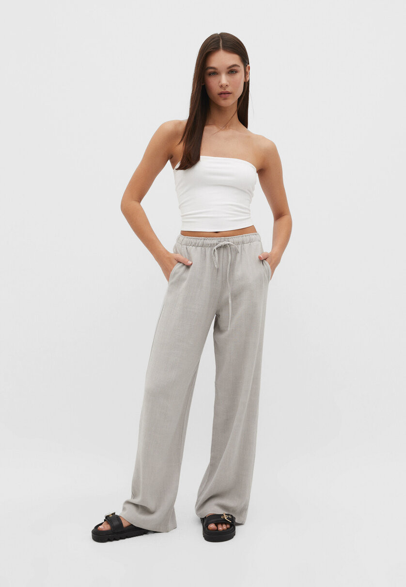 Loose-fitting linen blend trousers - Women's fashion | Stradivarius United Kingdom | Stradivarius (UK)