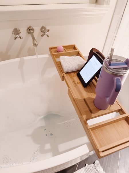 I just received this bath caddy as a gift and it’s taken luxury bath time to a whole new level! It holds all of my bath time essentials, including a bath bomb, Stanley tumbler, kindle and more. It’s available in several different colors and configurations and ships for free.  primary bath gift idea Amazon find free standing tub filler bath tub board 

#LTKfindsunder50 #LTKhome #LTKbeauty