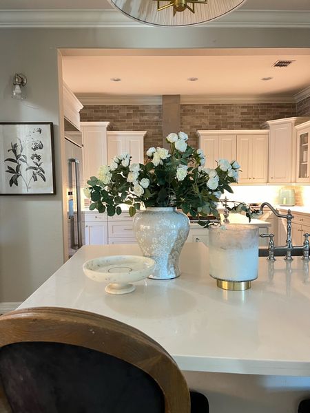 Kitchen countertop styled for spring 🌱🤍

#springhomesale 
#spring 
#springdecor 
Spring Kitchen 
Kitchen Styling
Roses 
Spring Florals 

#LTKSeasonal #LTKhome