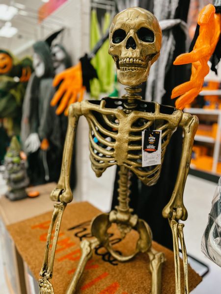 Halloween decor at Target. 60” Posable Gold Skeleton. Hello Pumpkin door mat, spooky and stylish decor. Must have for your front porch or front yard. Hyde & EEK. 

#LTKHalloween #LTKhome #LTKSeasonal