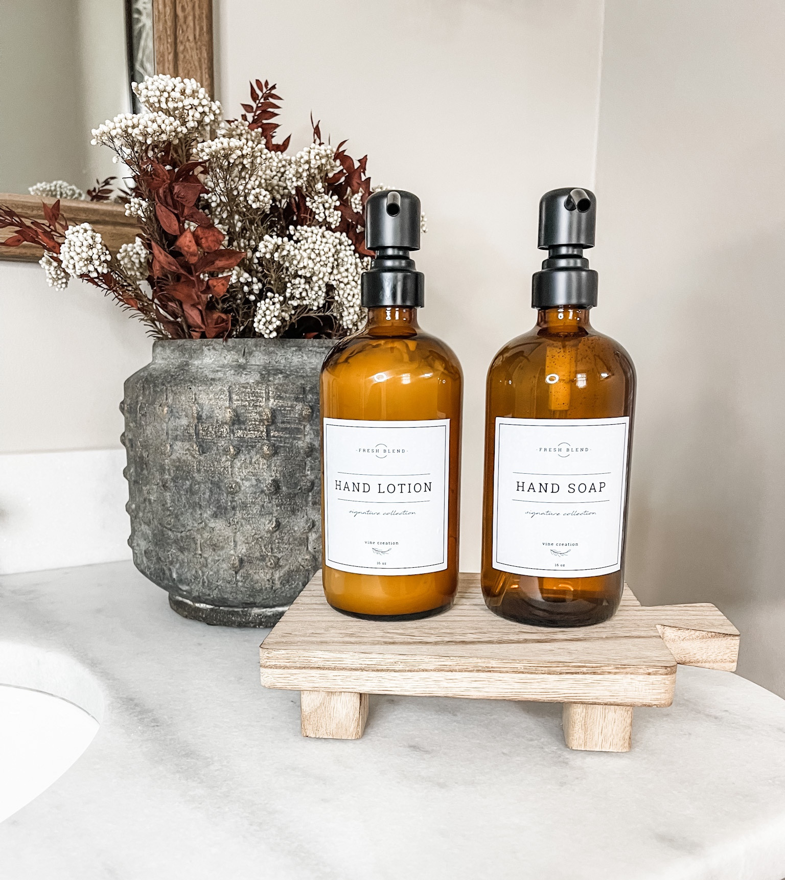 Spruced up our powder room with the perfect items that are serving up fall vibes. 🍂 

#powderroom #bathaccessories #powderroomaccessories #soapdispenser #lotiondispenser #fallflorals #vase #pedestal

#LTKunder50 #LTKhome #LTKstyletip