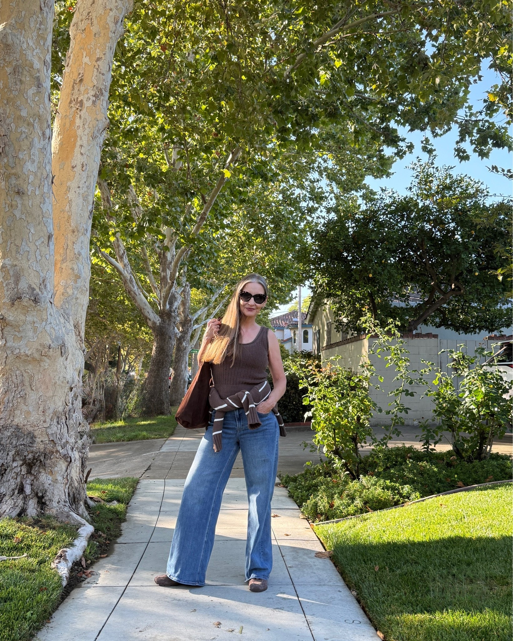 Weekend ootd, brown trend, casual. #widelegjeans #size10 #pearshaped #cottonsweater #summertofall #falltransition #suedesneakers #stripedsweater #suedehobobag

#LTKdayinmylife #LTKOver40 #LTKMidsize
