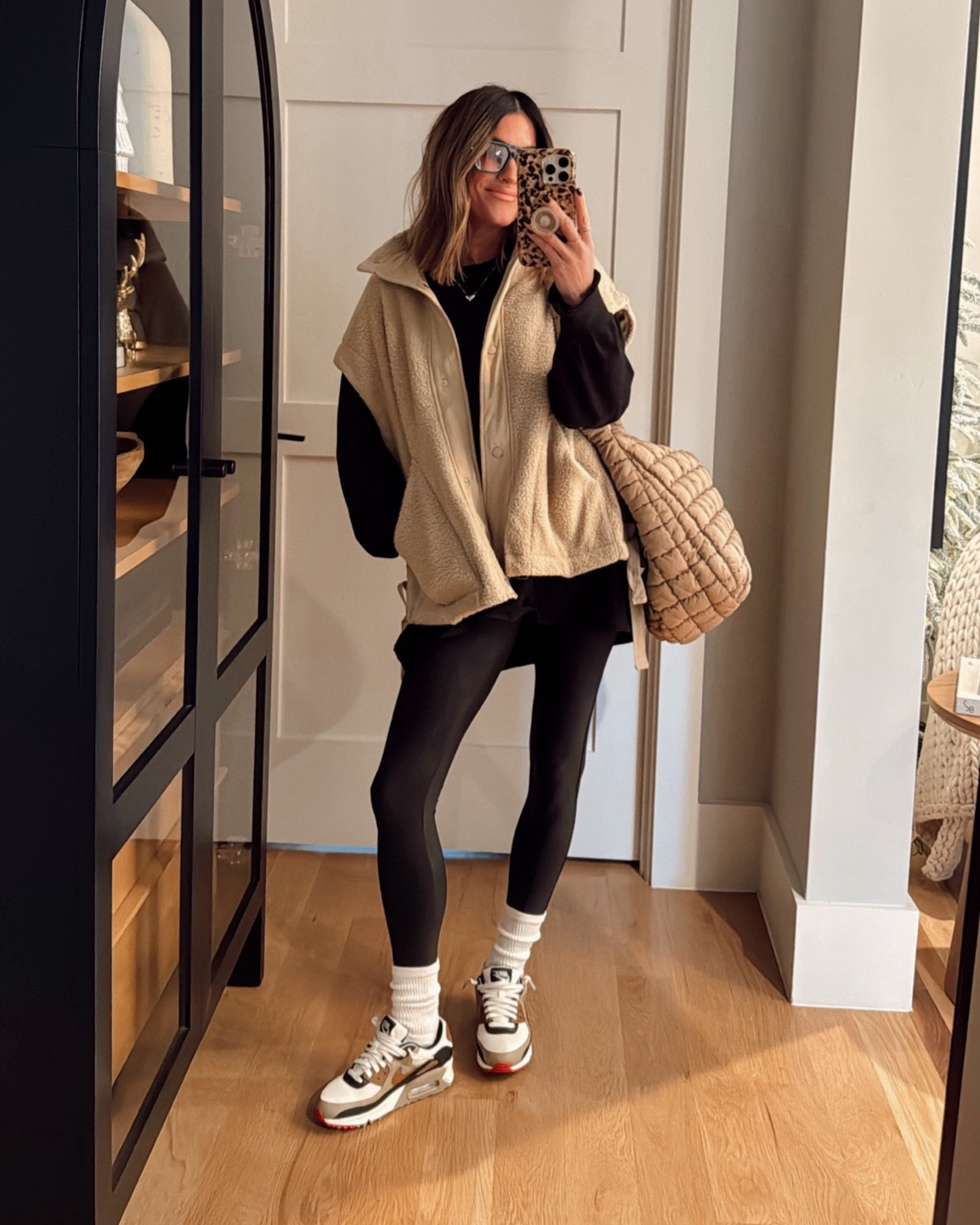 Comfy and cozy, but make it chic! 😎 Comfy, cozy, chic 🖤 wearing a size small in this FP look for less vest (shade is khaki), and a medium in this $12 tee! I could have also done a small, just wanted it long and oversized to wear with leggings. // Travel Outfit. Comfies. Causal. 

#LTKFindsUnder50 #LTKFindsUnder100 #LTKStyleTip