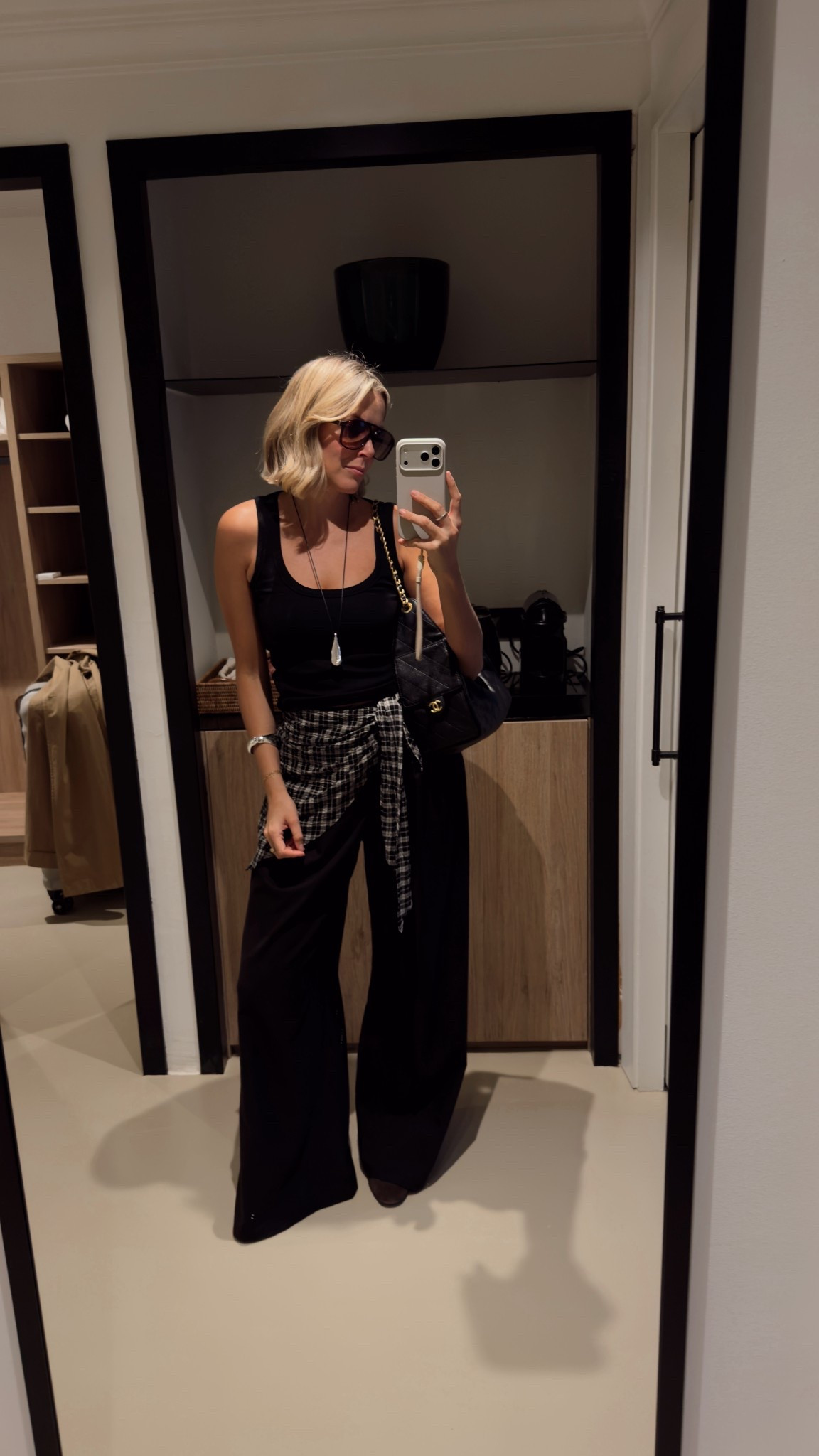 Black trousers, black vest, spring outfit, silver pendant necklace, cord necklace 

#LTKuk #LTKeurope #LTKspring