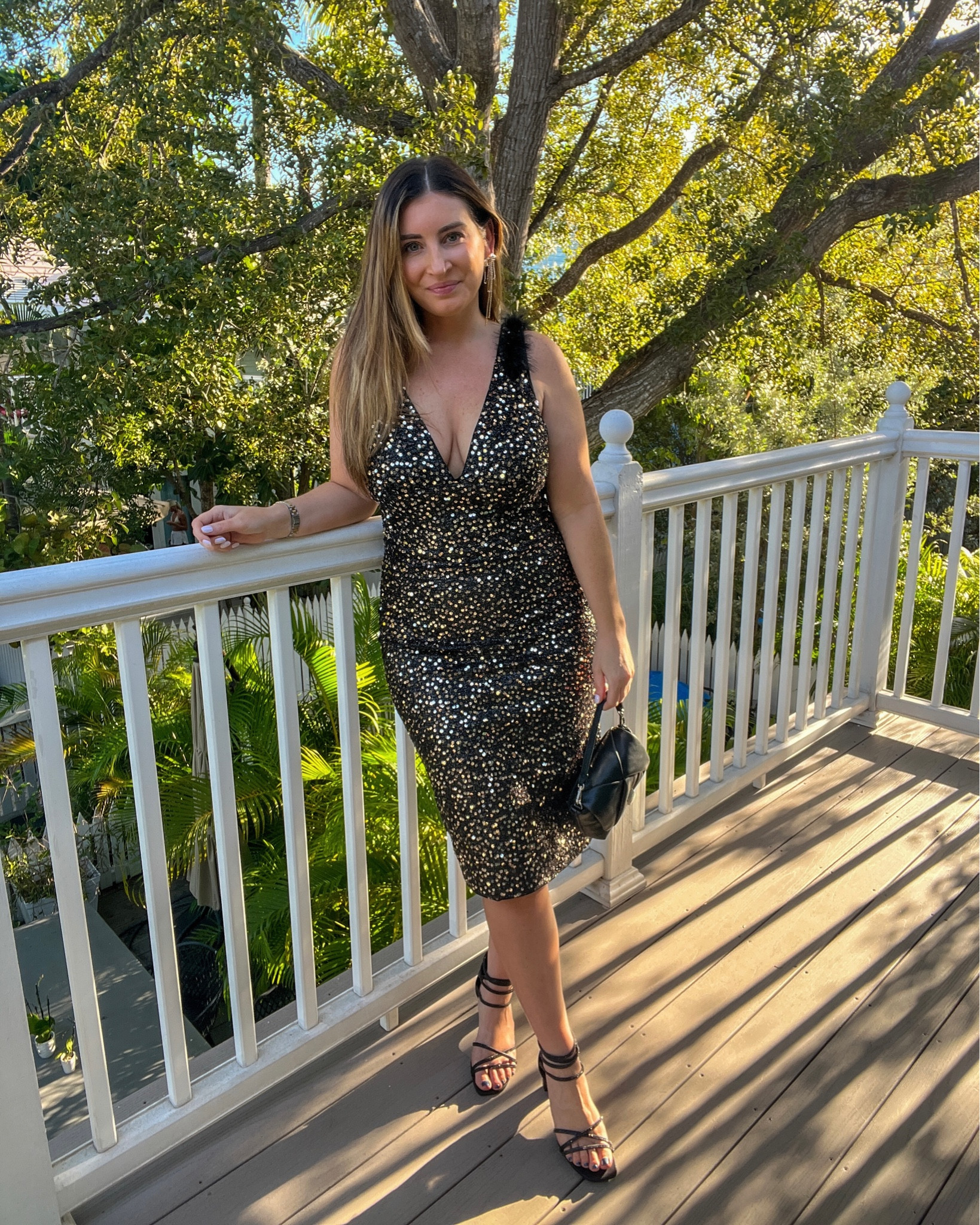 Sequin midi dress, gold and black sequin dress, holiday dress, Valentine’s Date dress, gold rhinestone bow earrings, black rhinestone heels, sandals, mini handbag, evening bag, outfit of the night in Florida, casual outfit, date night look 