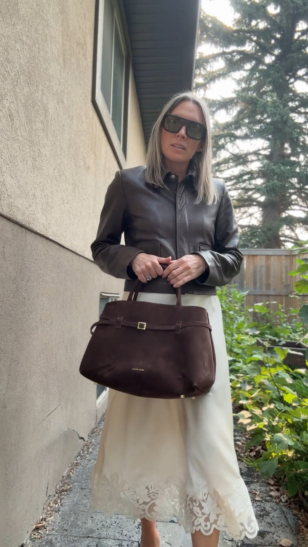 Nour Hammour leather jackets are the absolute best quality.  They are a more expensive brand than Zara but less than Khaite and the same quality as Khaite (imo) I’m in a size 36 (tts). This Manu Atelier bag is also an incredible price point for the amazing quality.  My skirt is sold out but I linked a dress that I think is stunning (and more versatile than this skirt).  My shoes are sold out in black but I found them in a few sizes in burgundy (shoes fit tts, I’m a true 37). They are truly the most comfortable heeled sandals I have ever worn.  Grab them for next year!

#LTKover50style #LTKstyletip #LTKcanada