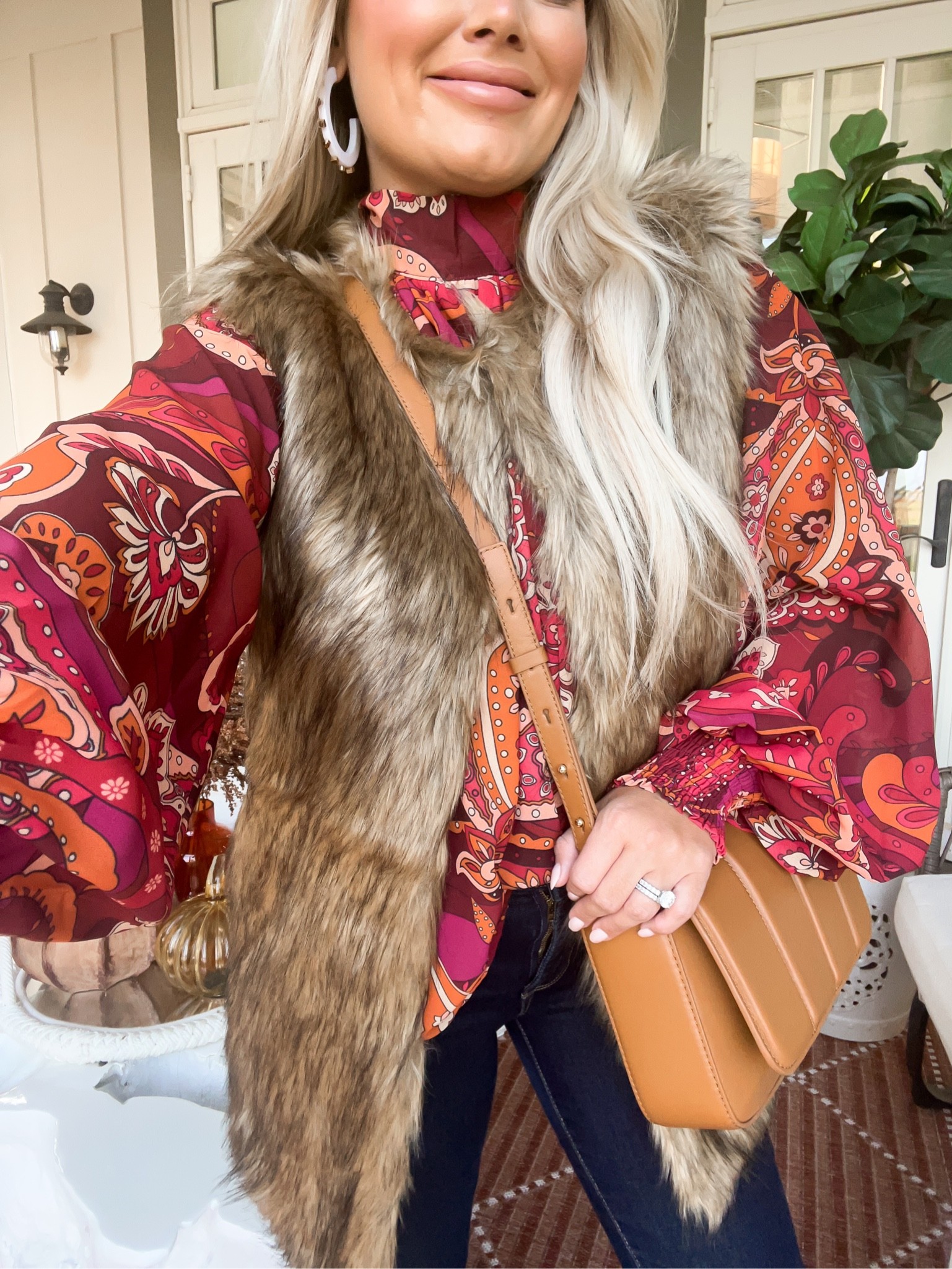 Beautiful fur vest 
Gameday style 
Thanksgiving day outfit 
Red dress try on 


#LTKunder100 #LTKSeasonal