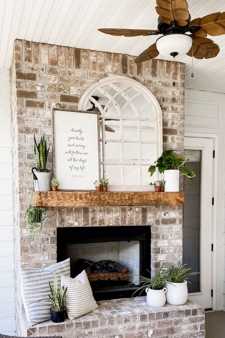 Fireplace and mantle screened porch backyard home decor and accents outdoor furniture outdoor living arch mirror mantel spring and summer seasonal home accessories 

#LTKSeasonal #LTKhome #LTKFind