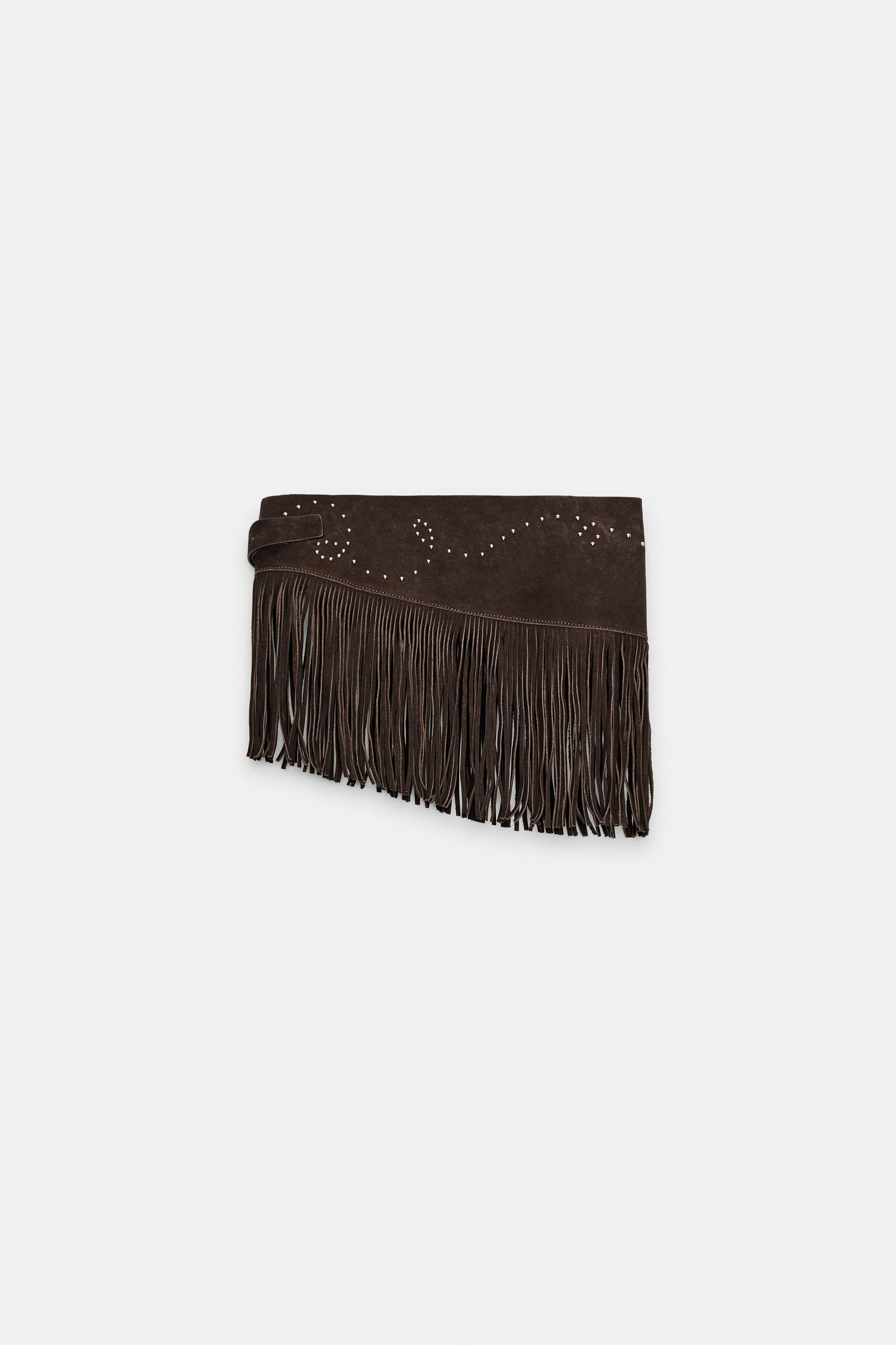 Model height: 183 cmSkirt-style belt crafted from 100% leather. Features contrasting stud appliqu... | Zara IT