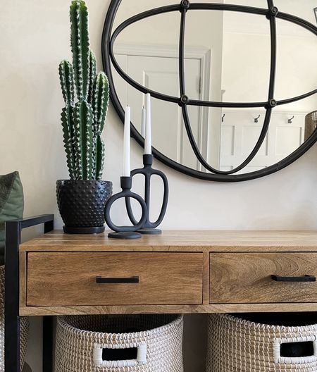 Entryway table modern farmhouse. 
Entryway mirror and lamp.
Black bobble planter 
black candlestick holders  

#LTKhome