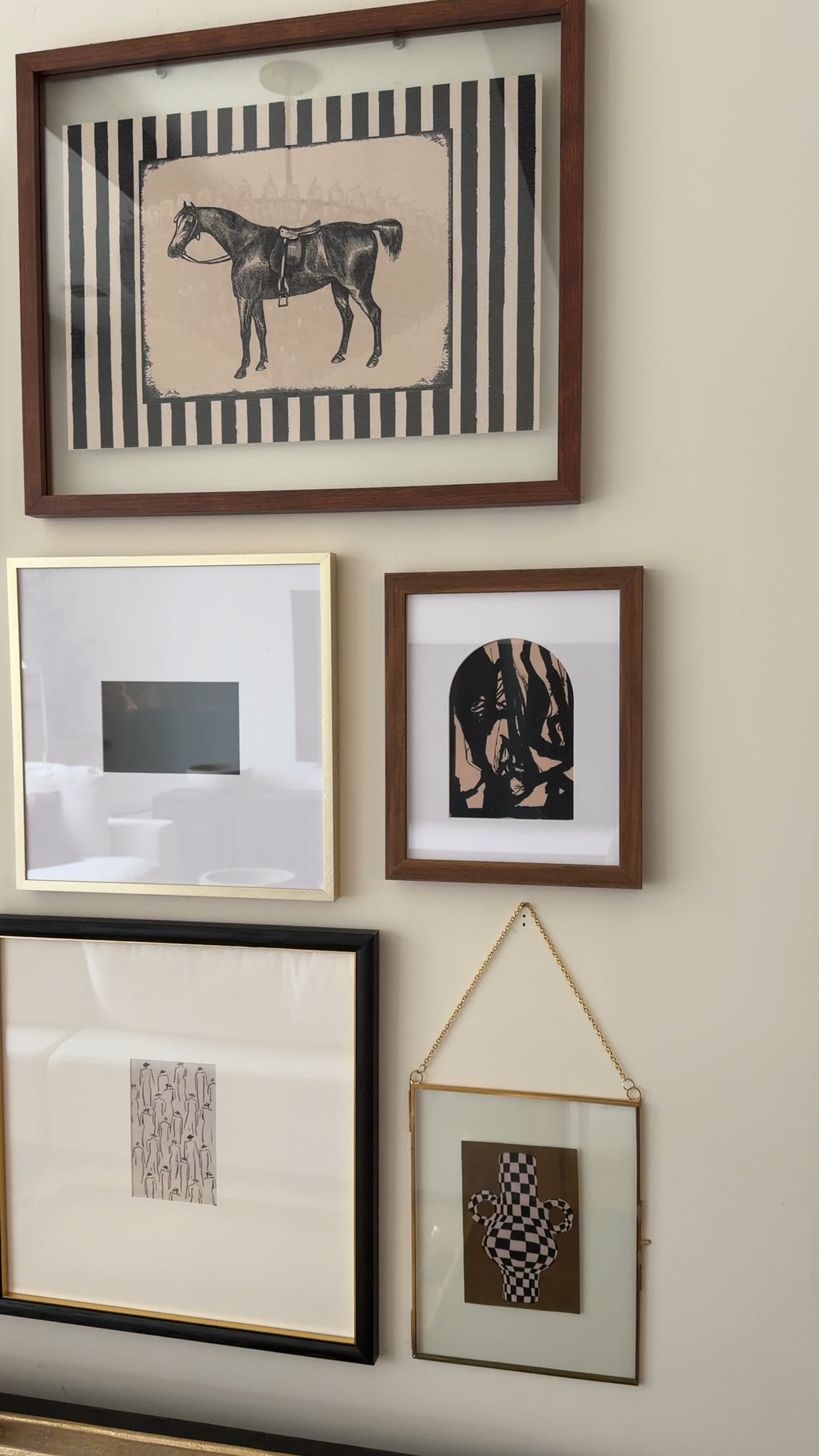 Collected, not cluttered. Keeping the color palette neutral but mixing frame sizes and finishes gives this gallery wall depth and interest. I rounded up similar art and decor to help you get the look.

wall frame set, neutral artwork prints, black and wood frames, console table decor, layered home styling, traditional modern interior, Amazon decor finds


#LTKSeasonal #LTKHome