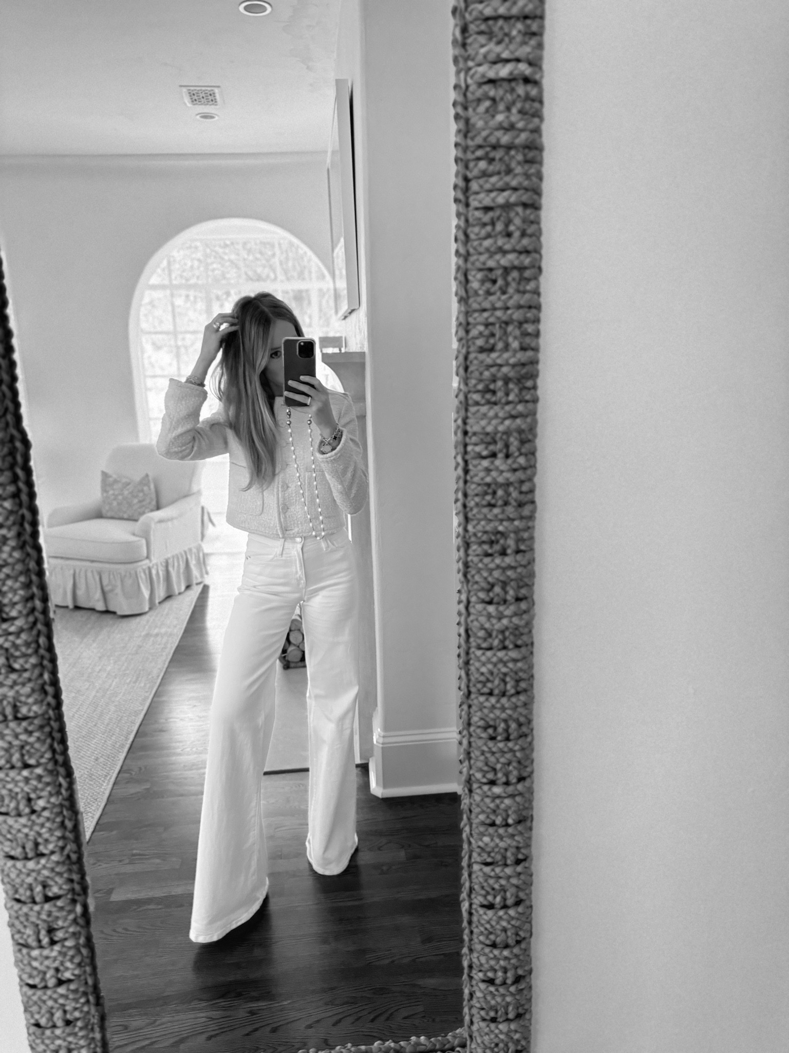 Lady jacket and wide leg jean uniform. 