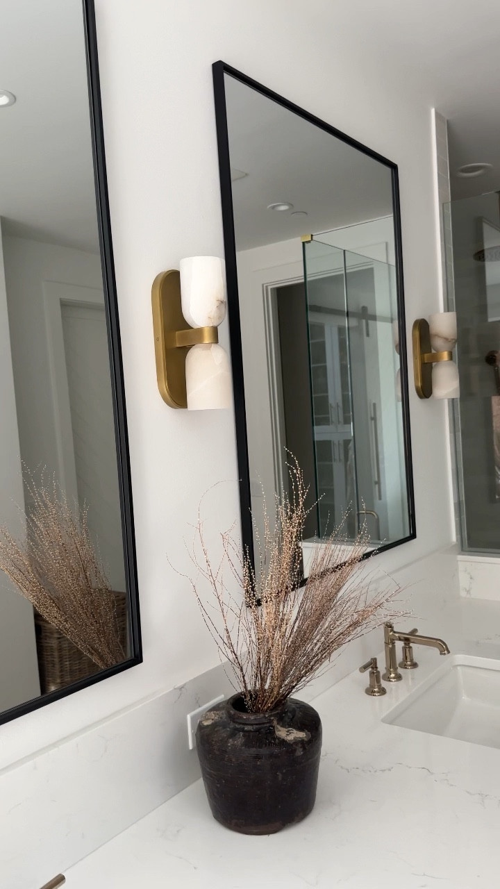 Bathroom sconce and vanity mirror 

#LTKsalealert #LTKstyletip #LTKhome