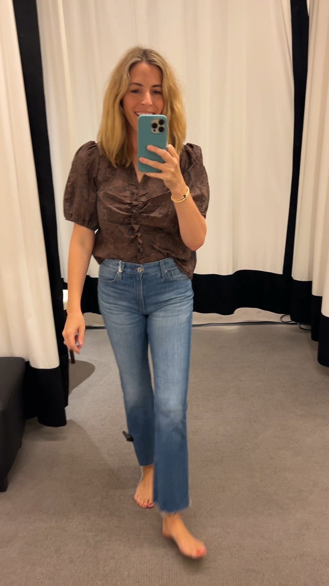 Black and brown snake print top perfect for Fall. Paired with our new faVE AG bootcut jeans. Both tts. Laura in a small on top and a 26 in jeans. Pair with black booties! 

#LTKVideo #LTKSeasonal #LTKOver40