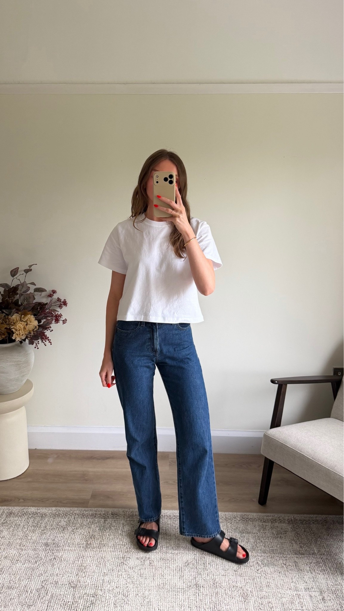 Small in the UNIQLO boxy white t-shirt
W23 L31 in the JWA UNIQLO blue straight jeans, colour: 67 blue 
I’m 5ft 6
Birkenstock sandals