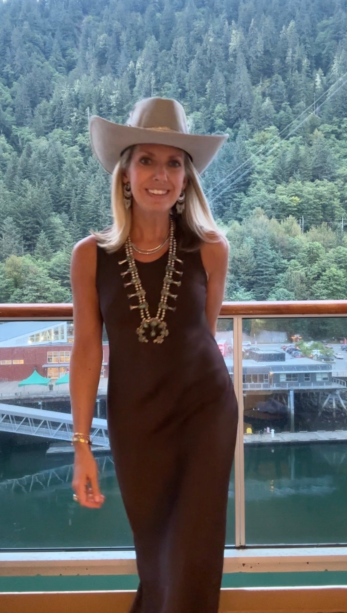 The best fall dress!

Simple brown satin maxi dress, but make it western! Just add a sweater as it’s getting cooler. Comes in many colors - I bought the burgundy also!

Cowgirl
Western themed
Turquoise Squash blossom 
Navajo jewelry necklace silver
Diamond ring
Fringe earrings
Cowboy hat 
fine jewelry
Gold necklace 
Strappy nude sandals
Alaska work Outfit 
Fall winter 
Work outfit dress 
Date night 

#LTKStyleTip #LTKParties #LTKFindsUnder100