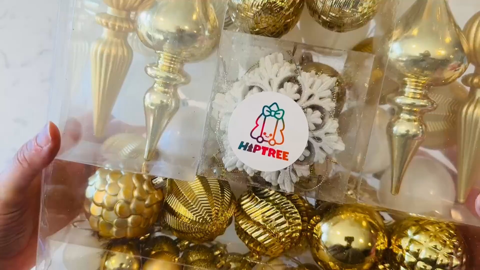 #ad This post contains affiliate links, which means I may earn a small commission if you make a purchase through my links.
This ornament set comes with a mix of white and gold tones in different shapes and textures - the perfect combination for a classic, elegant tree. 

 #LTKSeasonal #LTKHome