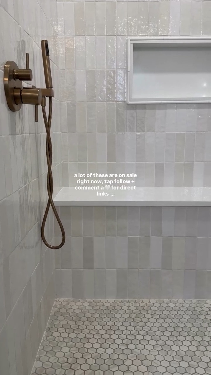 hi! ◡̈ tap follow for home inspo, DIY and comment a 🤍 for direct link to shop all of our selections 

Haters gonna hate 🤣 but everyone warned me about having blonde hair, but the type of floor we got, when i vacuum I am actually shocked how much hair gets sucked up bc I never see it 🤣 I love the mixed metals and the delta champagne bronze fixtures are my fave in our entire house. 

questions? comment below! 👇🏼 

#bathroomremodel #mixedmetals #vaultedbathroom #loweshomeimprovement #wayfair @bedrosianstile @loweshomeimprovement @wayfair