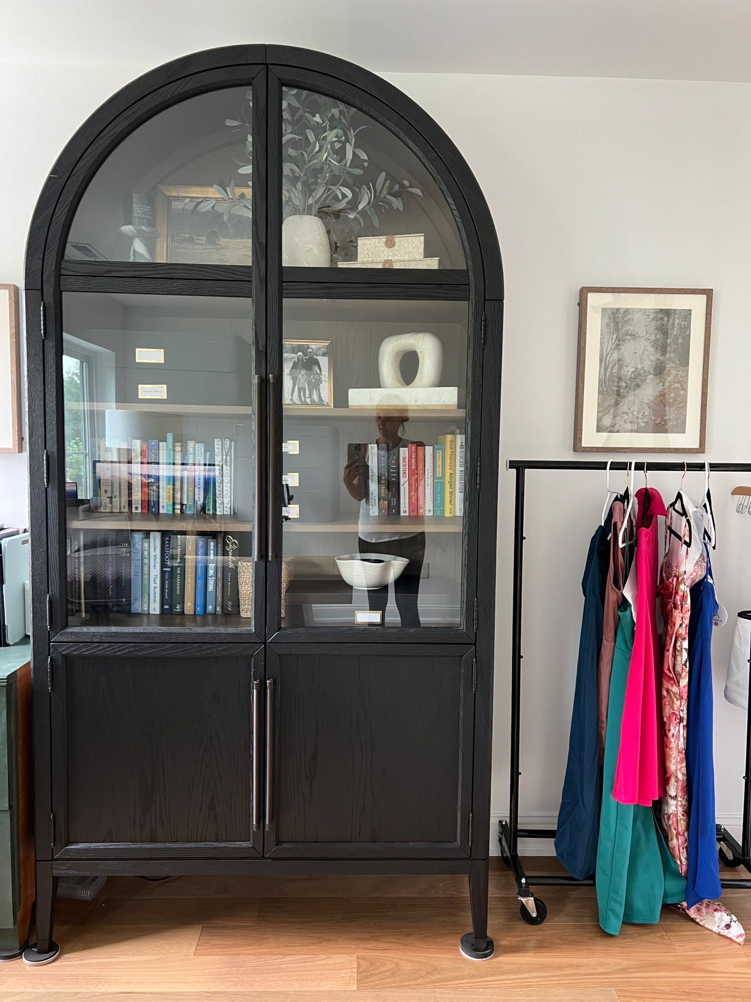 I wanted a clean, modern home office with contrast, so I went with this arched black cabinet from Arhaus. It’s perfect for styling books, props, and decor while giving the room height and structure. If you need office storage that doubles as a focal point, this cabinet is a great anchor piece.

#LTKHome #LTKOver40 #LTKStyleTip