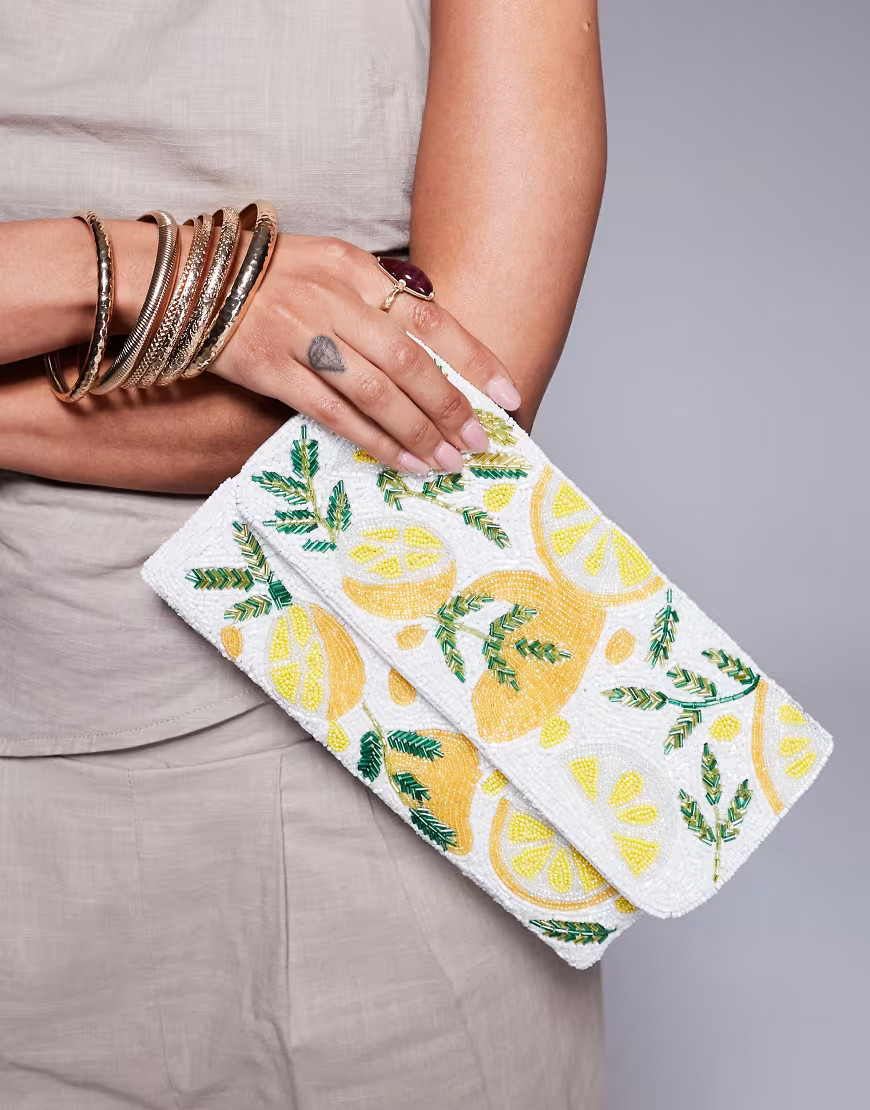 True Decadence lemon beaded clutch bag in white/yellow-Multi | ASOS (Global)