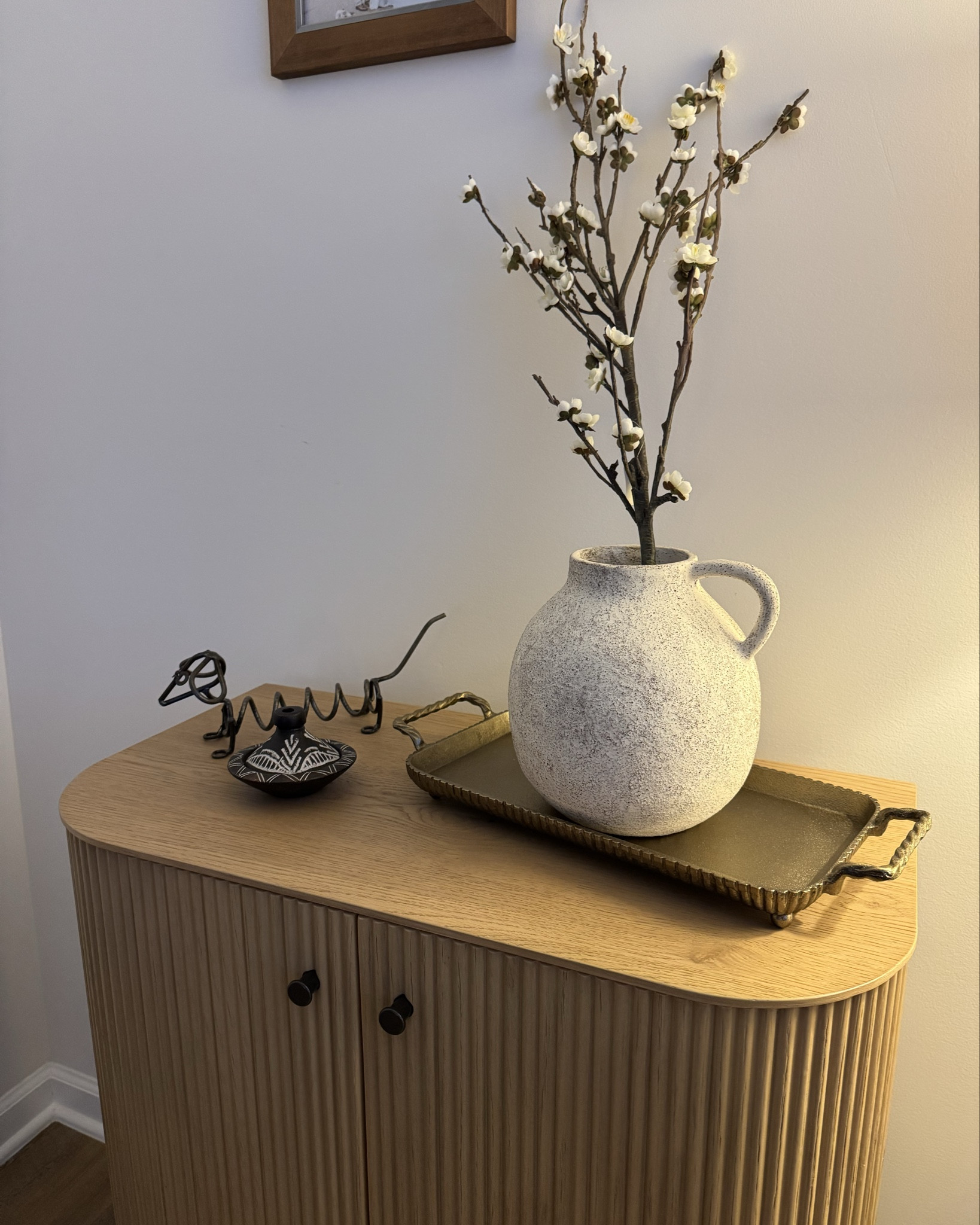 I couldn’t find the exact gold tray, so I linked a similar one. 

Unfortunately I purchased the decorative tangine in Morocco, so it is unable to be linked. I also cannot link the wire dachshund statue, as it was a handmade and gifted to me  

#LTKHome #LTKStyleTip #LTKOver40