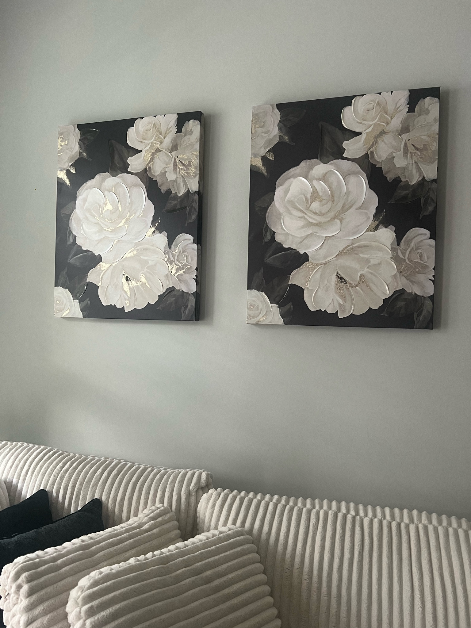 I love these floral canvas paintings for my living room. I’ve been incorporating black into my style and these are perfect to maintain the feminine flare. 

#LTKHome