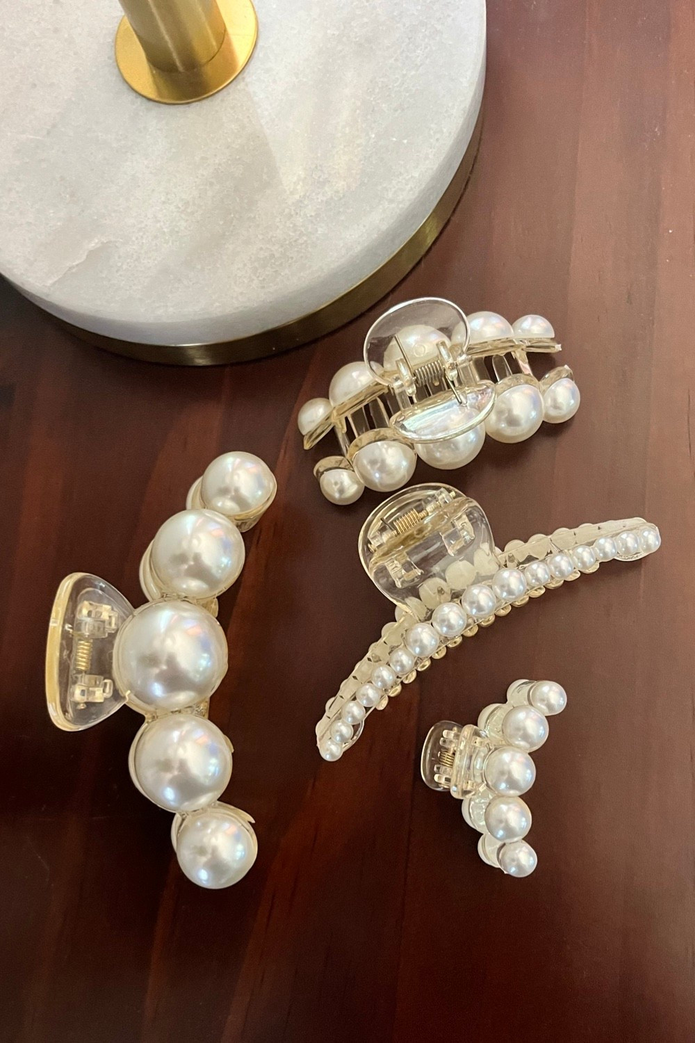 I’ve had my eye on these pearl hair claws for a while and got them as a gift recently. They are beautiful in person and work well with my fine hair. Would be so pretty for any pre wedding bridal event or even the day of itself! On Amazon.

#LTKWedding #LTKSeasonal #LTKBeauty