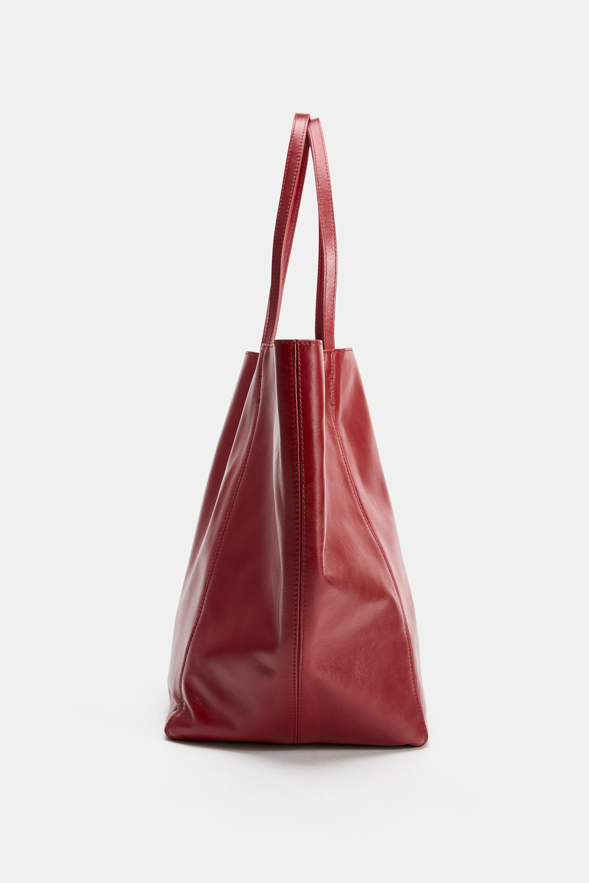 Leather tote shoulder bag. Topstitching detail on the top. Removable interior compartment with zi... | Zara UK