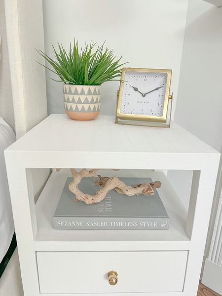 I keep my nightstand styling pretty simple in our primary bedroom! Also linked a great "look for less" option for my nightstand! 
-
Coastal Nightstands, primary bedroom decor, coastal home decor, coastal styling, beach home decor, beach house style, coastal bedroom, coastal interior, coastal decorating, white nightstand, faux plant, gold clock, 2 drawer end table, end table, upholstered bed, blue and white geometric pot, planter, table clock, bedroom styling, neutral home, nightstand styling, nightstand decor, coastal nightstands, beach house bedroom, beach house nightstands, Amazon coffee table books, driftwood branch, shelf styling. Nightstands with shelf, nightstands with drawers, Wayfair nightstands, table clock, neutral coffee table book, narrow nightstands, small nightstands

#LTKfindsunder50 #LTKhome #LTKstyletip