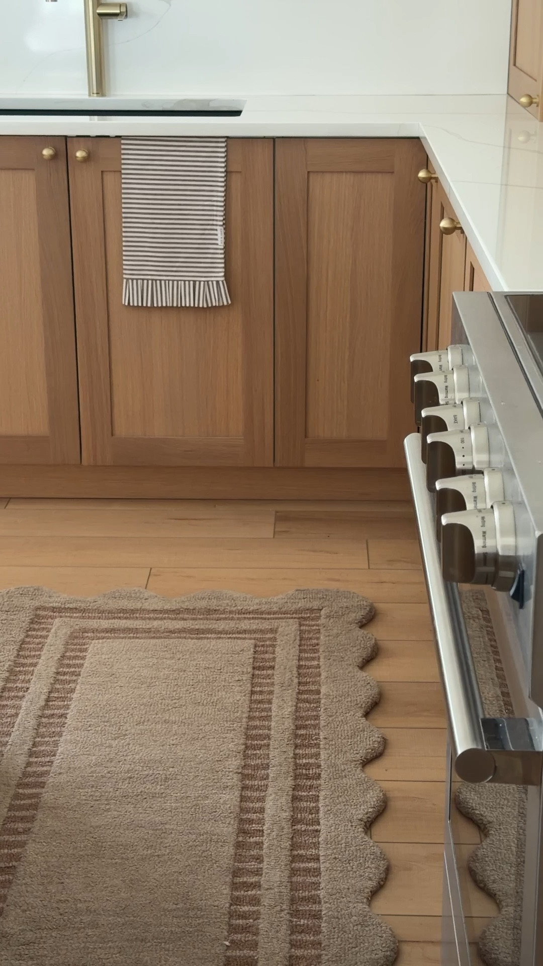 Still not over this scalloped mocha rug 🤎

#LTKSaleAlert #LTKHome #LTKSpringSale