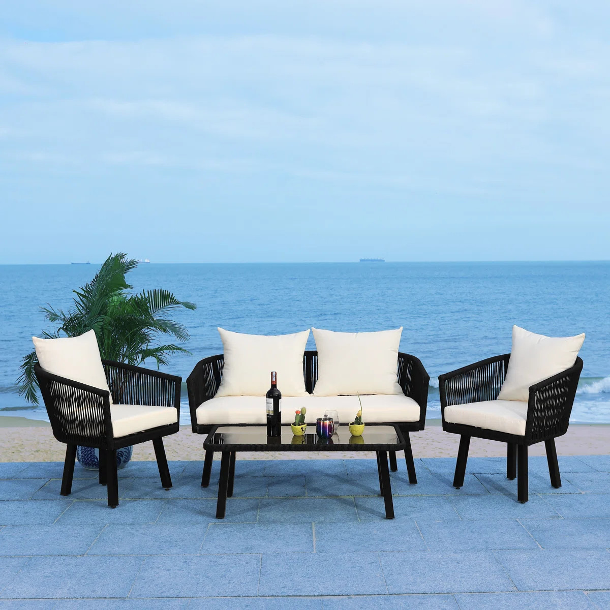 Oropeza 4 - Person Patio Conversation Set with Cushions | Wayfair North America