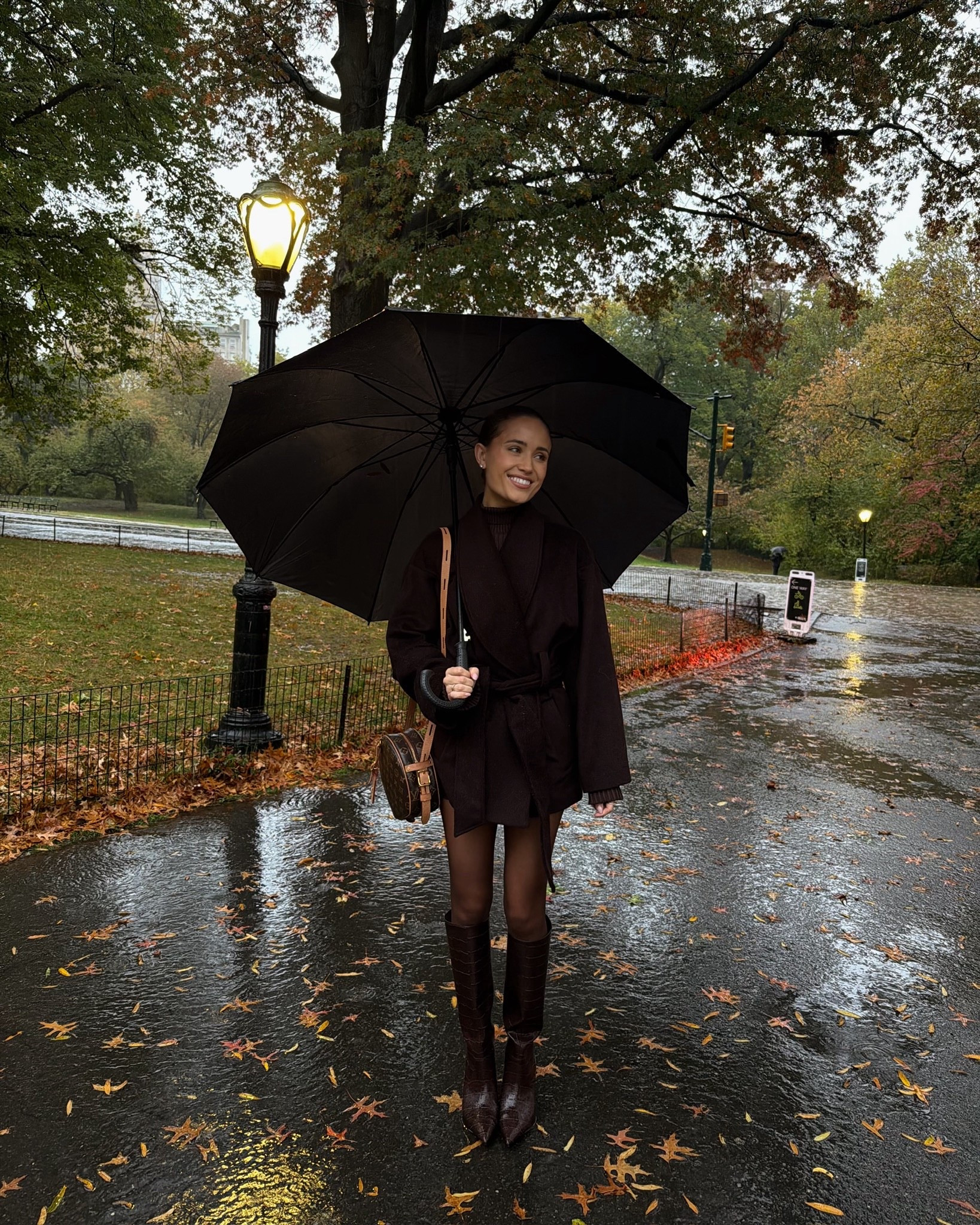 A rainy day in NYC🤎 wearing a brown Jacket and knit by Karen Millen, H&M boots, Louis Vuitton Bag and brown Calzedonia tights. Use code KATE20 for 20% off Karen Millen

#LTKautumn