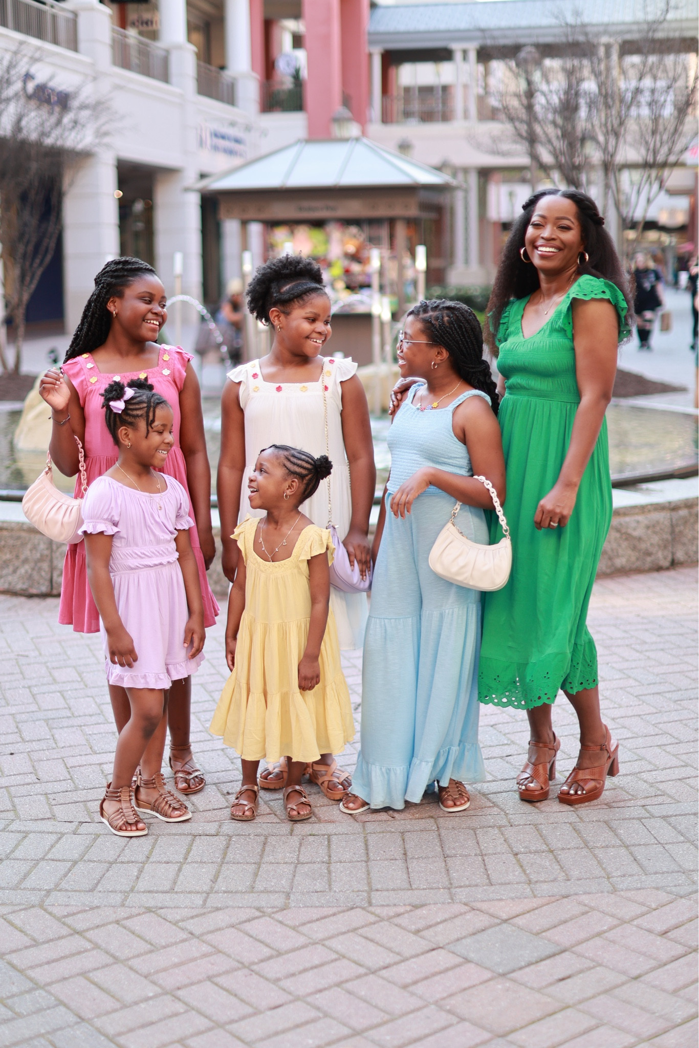 Now this look with my minis screams springtime with all the beautiful pops of color!! Having each of us take a monochromatic hue of spring created a beautiful color palette for the overall look!! 🌸 Shop these spring dresses for your next cute look!! 

#LTKfamily #LTKkids #LTKstyletip