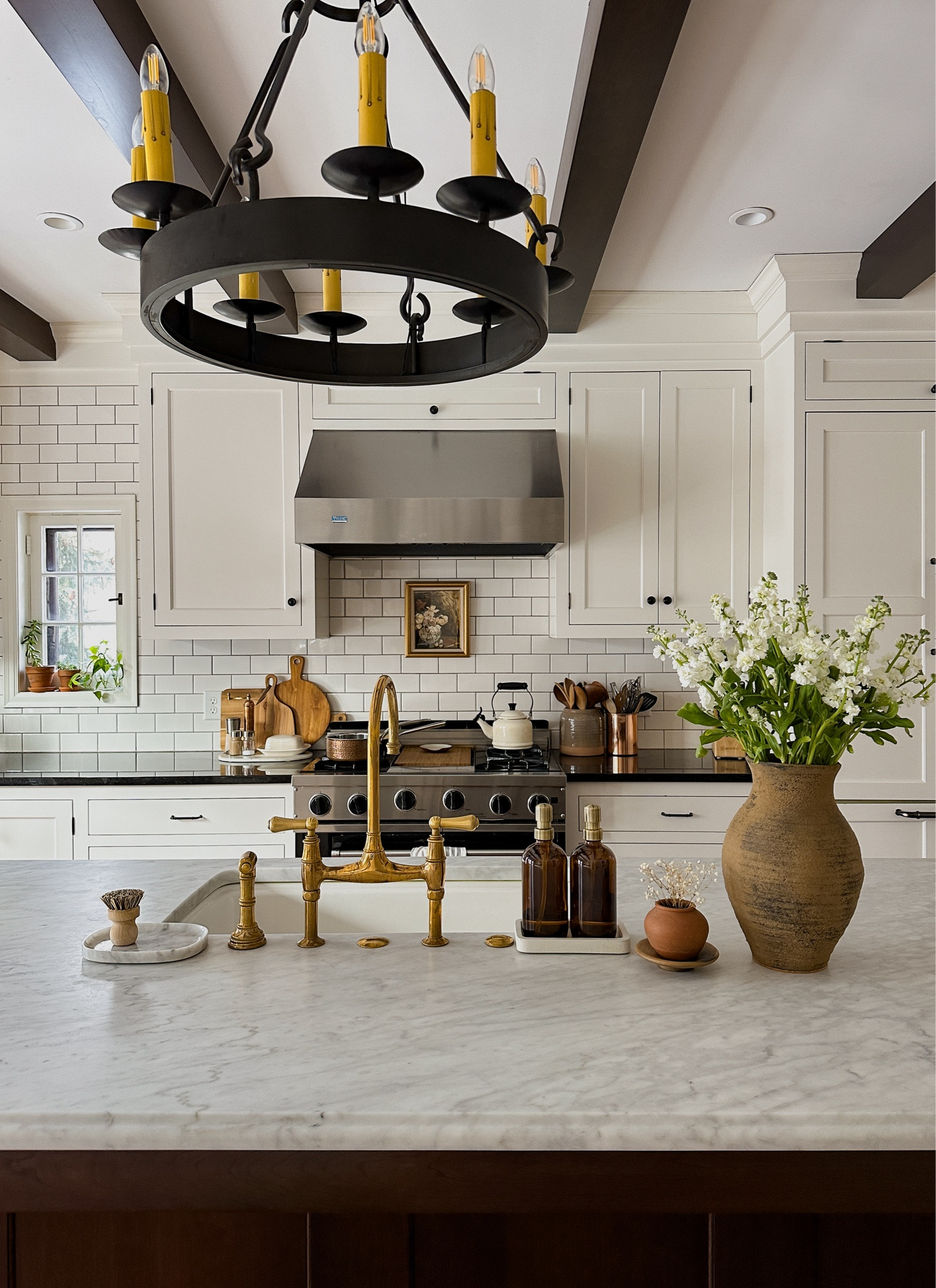 kitchen view. *unlacquered brass faucet, glass soap dispensers, clay vase (20% off with code: FEB20), marble tray, scrub brush, cabinet hardware, cream tea kettle

#LTKstyletip #LTKhome